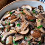sauteed mushrooms in a bowl close up