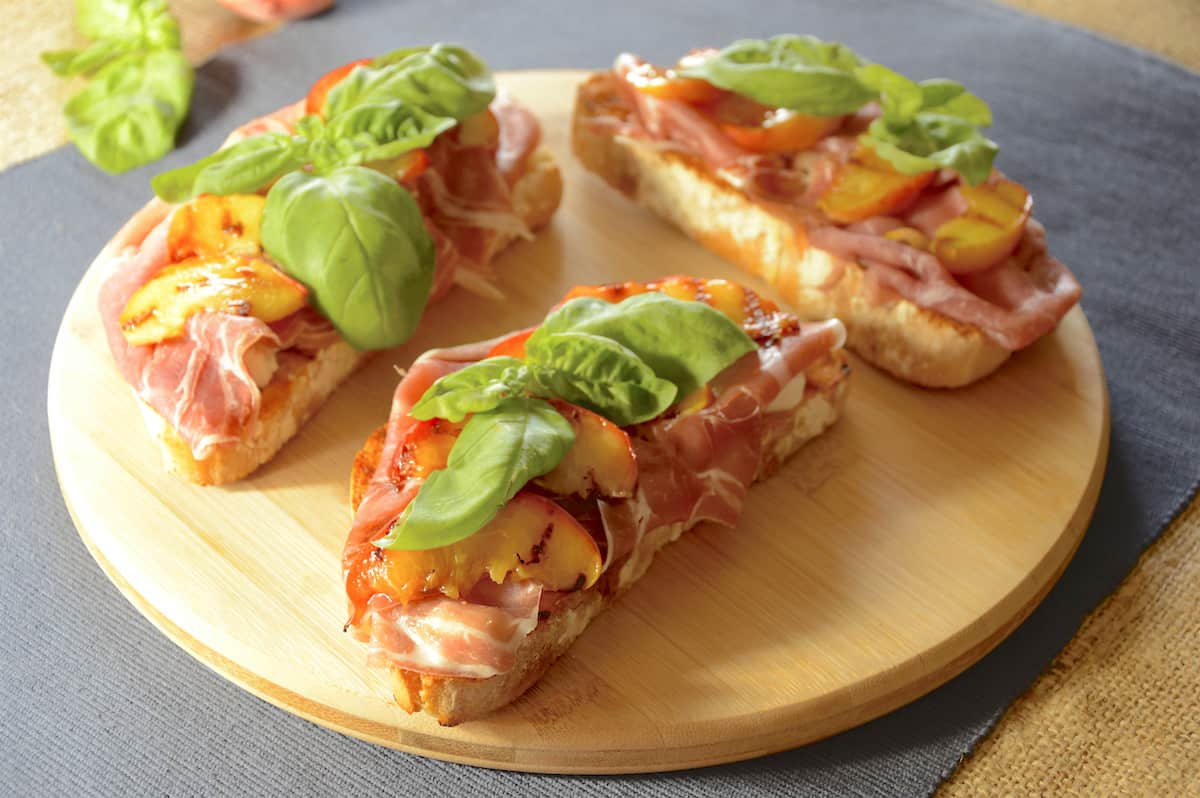 Bruschetta with Mozzarella, Prosciutto & Grilled Peaches