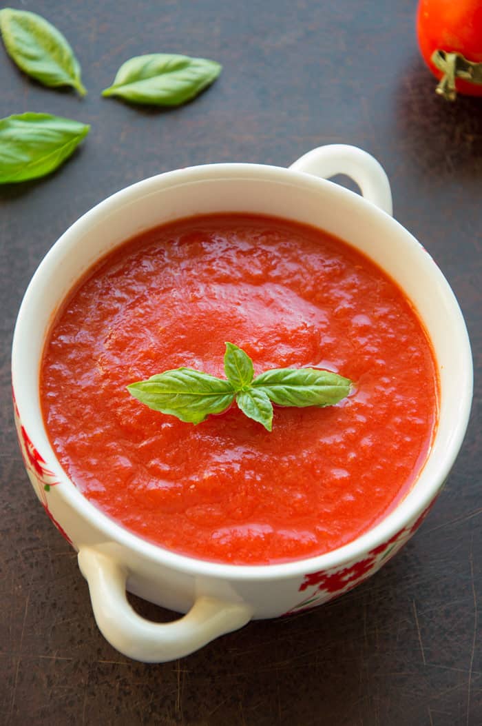 Homemade Italian Tomato Passta with Fresh Basil Leaves
