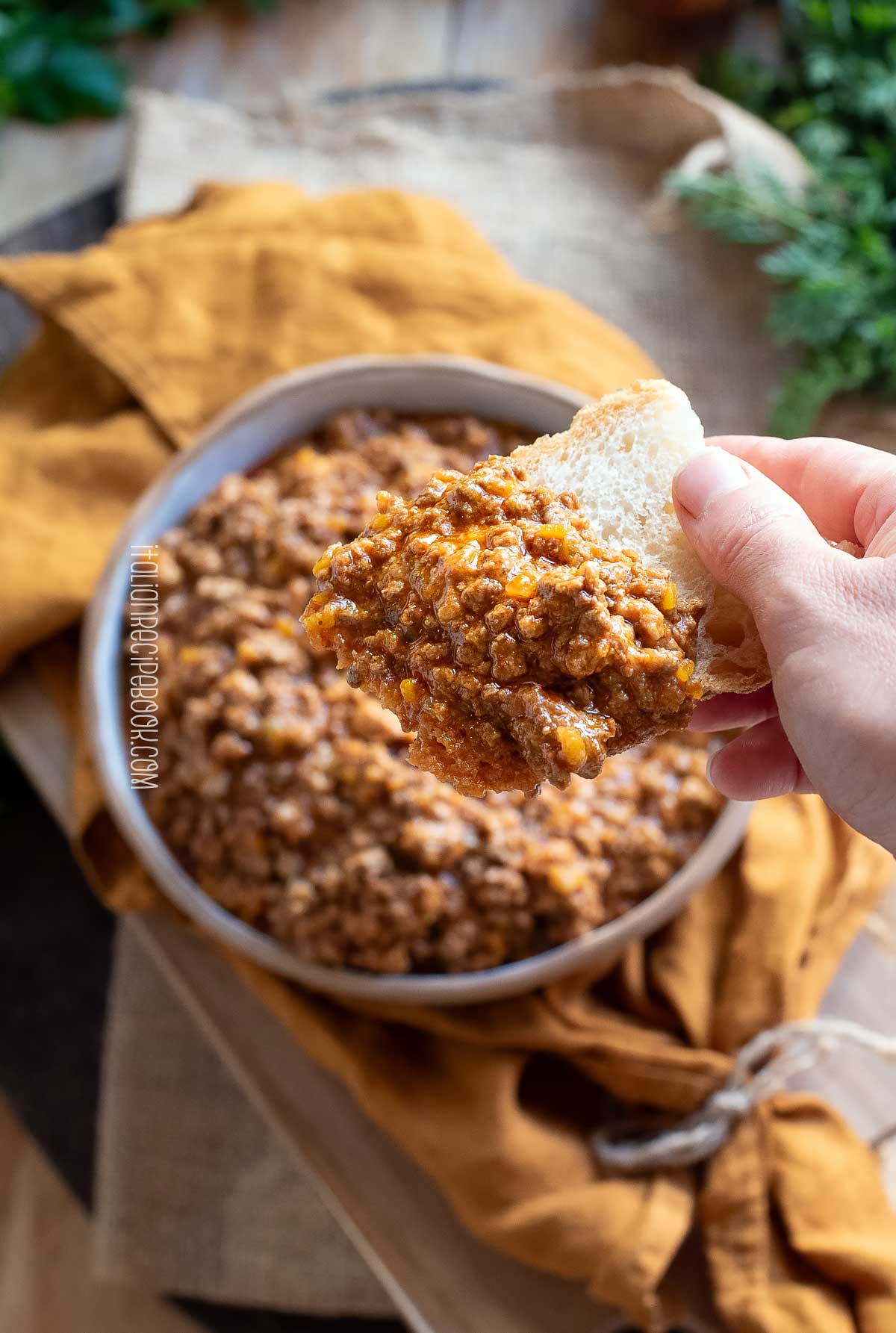 ragu bolognese on a piece of bread