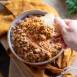 ragu bolognese on a piece of bread