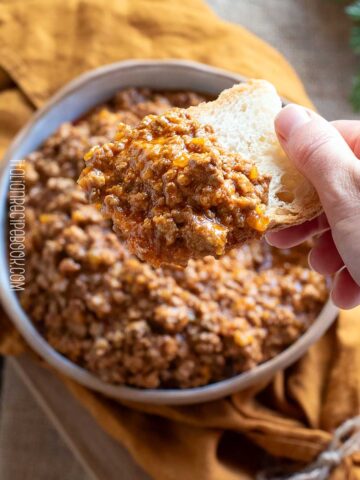 ragu bolognese on a piece of bread