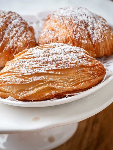 Sfogliatelle pastry on a serving place.