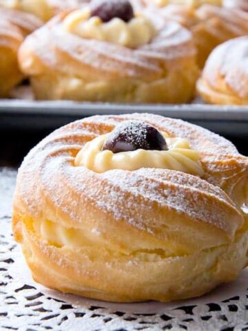 Zeppole di San Giuseppe with pastry cream and amarena cherry.