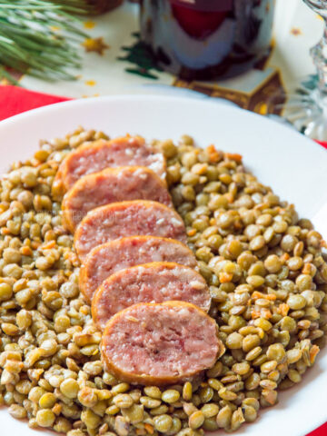 Cotechino Sausage on a plate with lentils