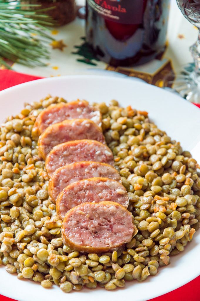 Cotechino Sausage on a plate with lentils