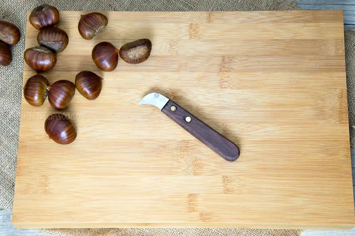 Chestnut Knife on a cutting board