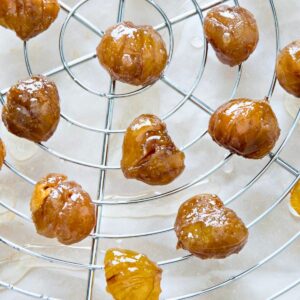 Marron glace on a wire rack.