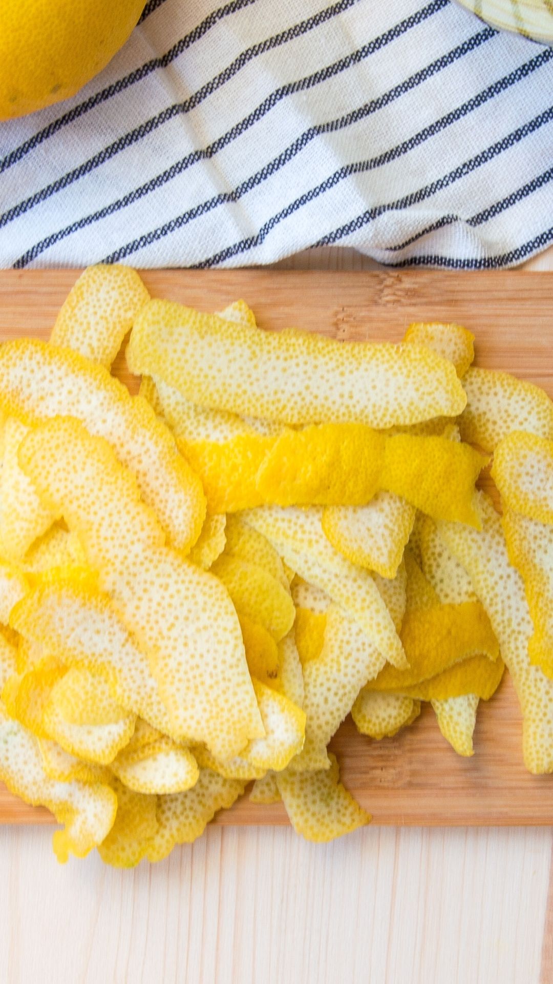 lemon peels on a cutting board