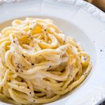 a bowl of cacio e pepe pasta
