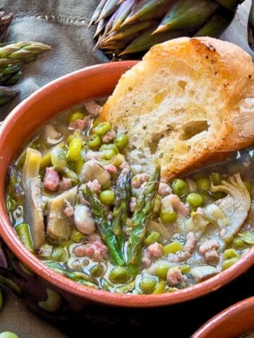 Garmugia soup in terracotta bowl.