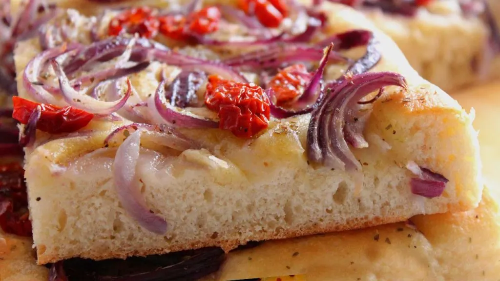 focaccia with onions and dried cherry tomatoes