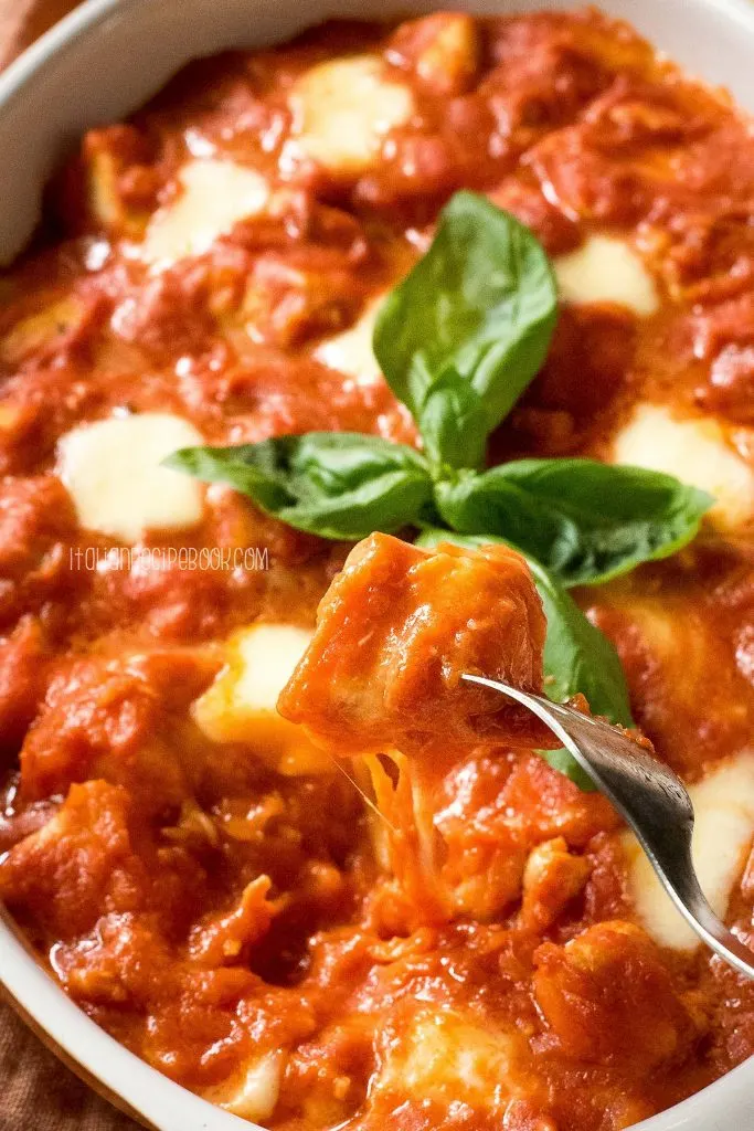 chicken sorrentino picked with a fork