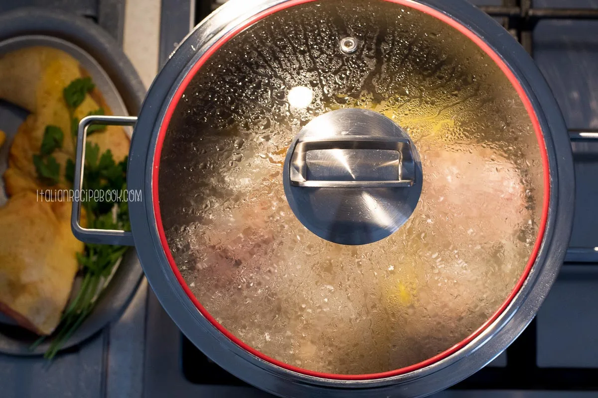 simmering broth in a pot