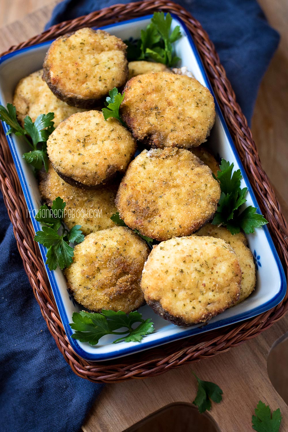 ricotta stuffed mushrooms in a serving dish