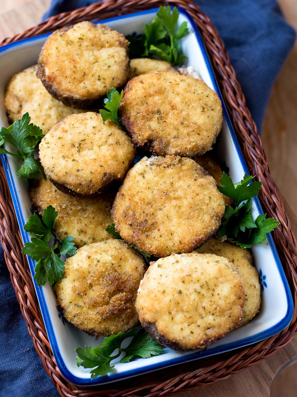 ricotta stuffed mushrooms on a serving plate