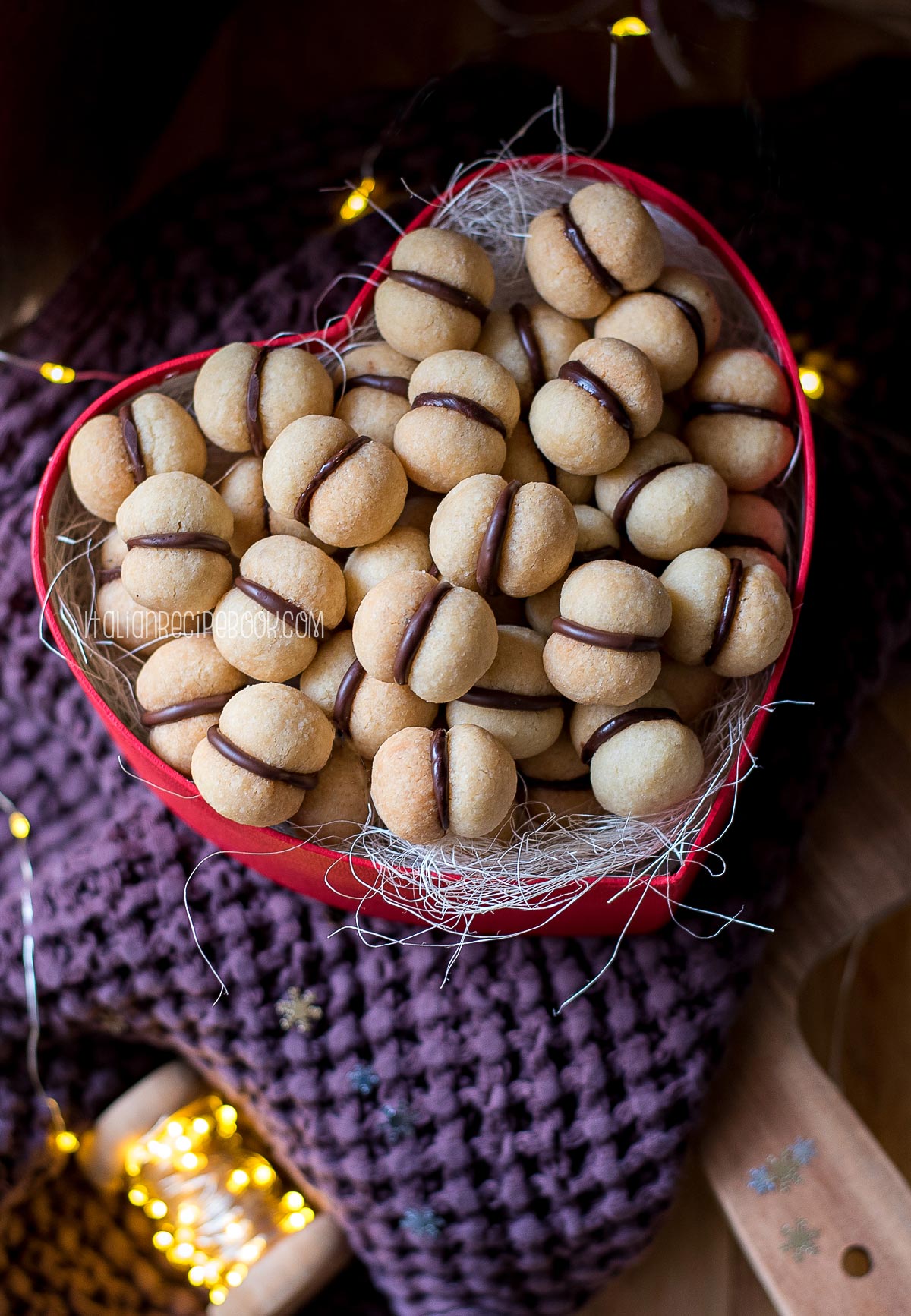 baci di dama cookies in a red box