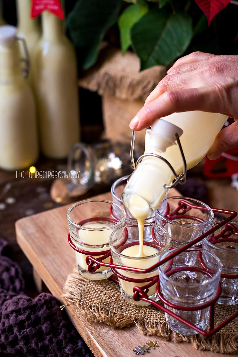 pouring limoncello cream in shot glasses