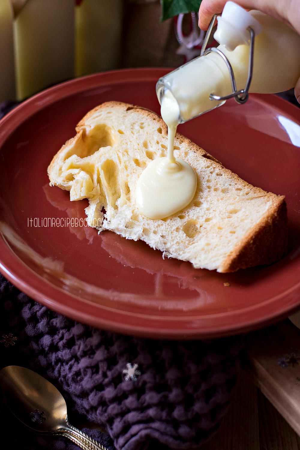 pouring limoncello cream over italian christmas cake