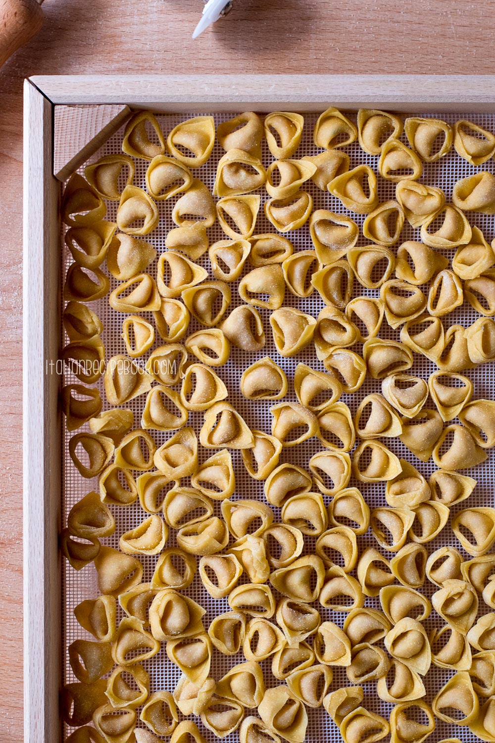 tortellini on a drying rack