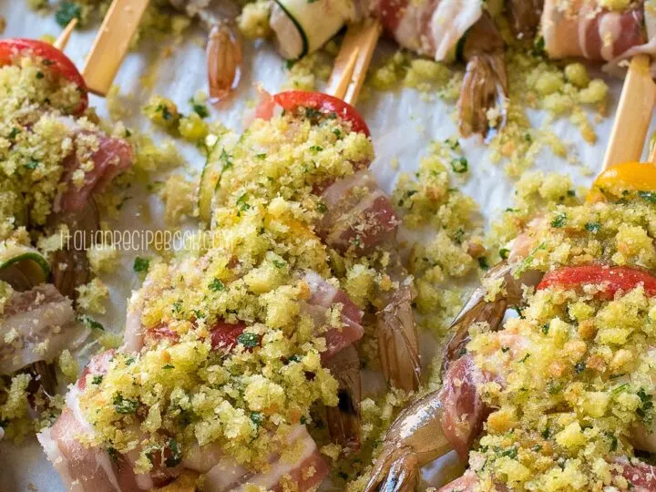 shrimp zucchini skewers on a baking sheet