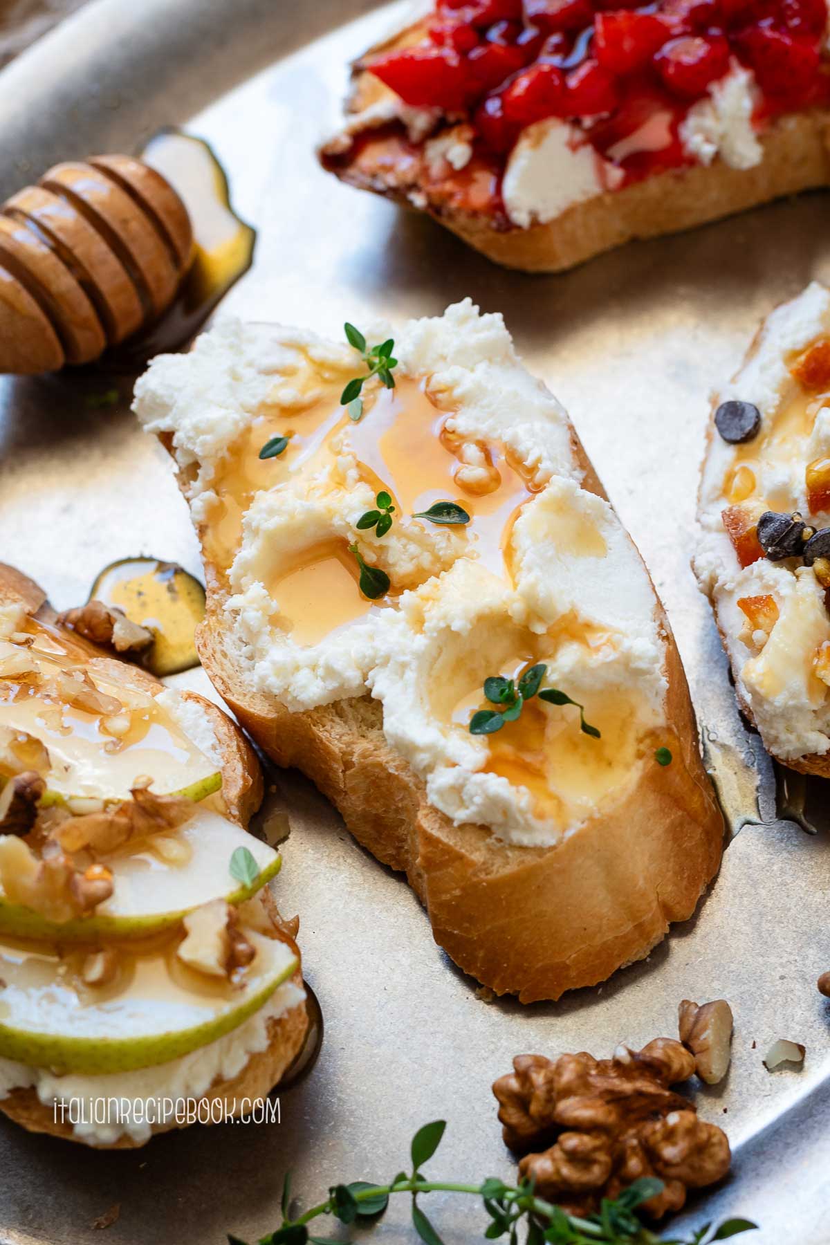 Ricotta crostino topped with honey and thyme.