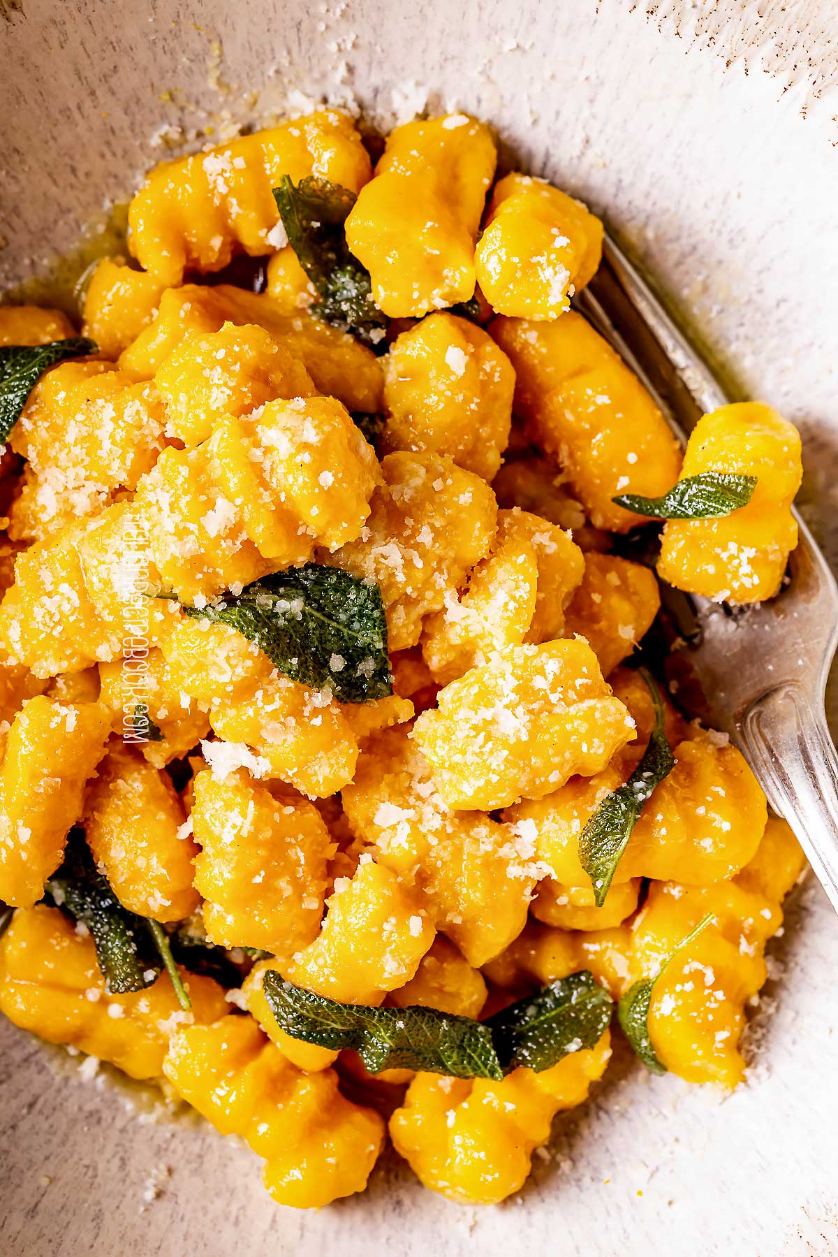 pumpkin gnocchi with sage butter sauce close up