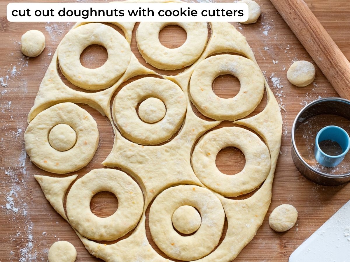 Cutting out the doughnuts.