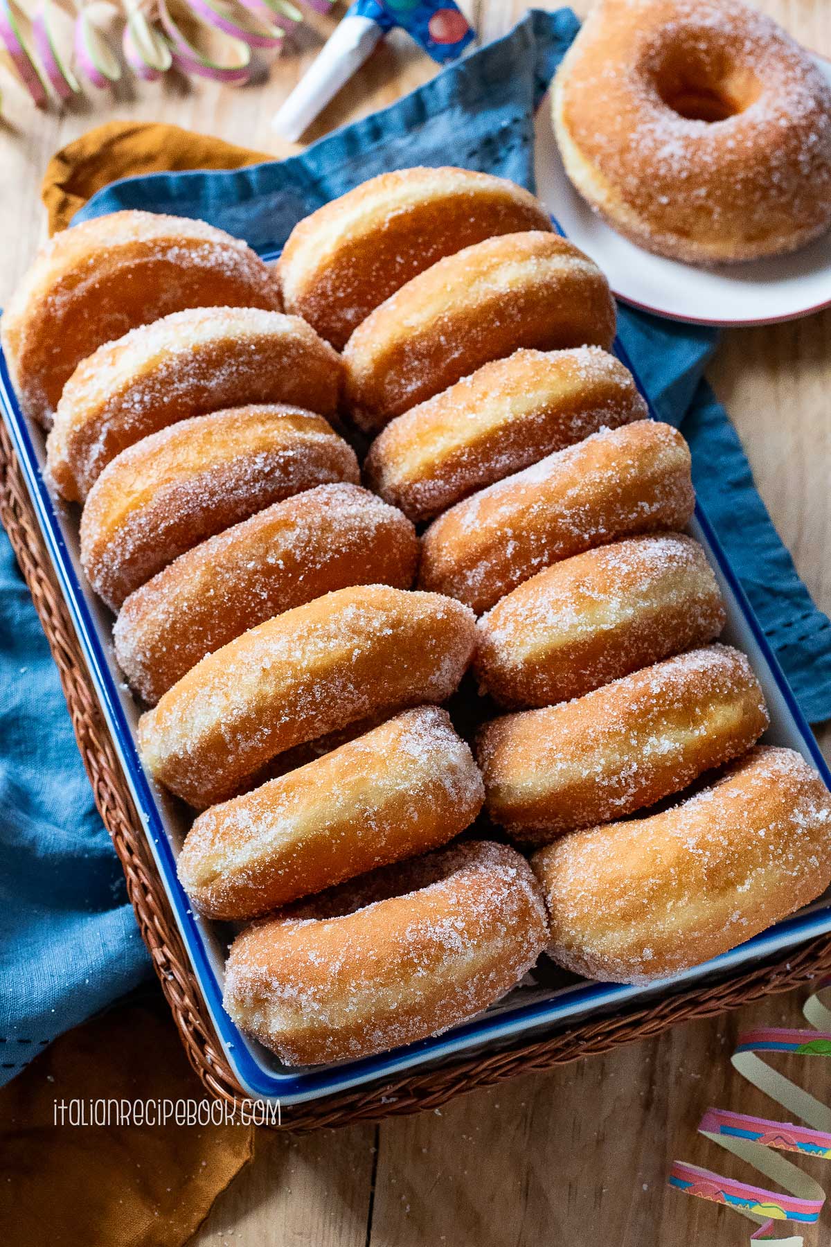 Graffe - Italian potato doughnuts on a tray.
