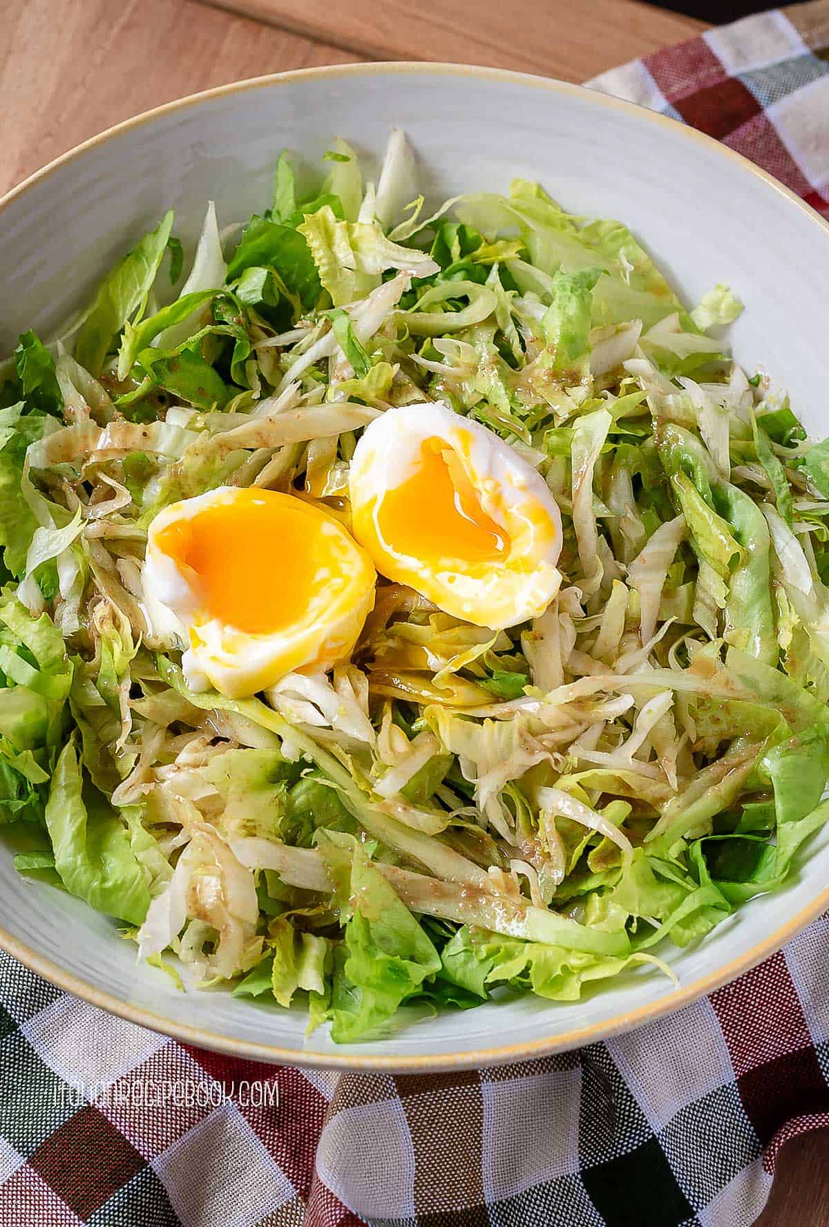 Escarole salad alla Romana with poached egg.