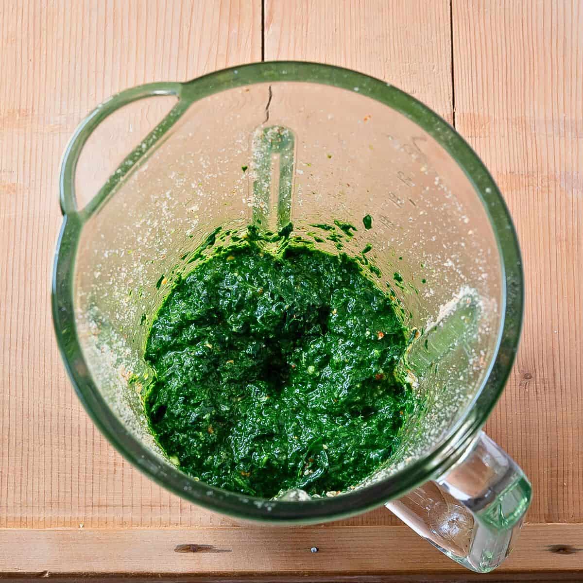 Kale pesto in a food processor.