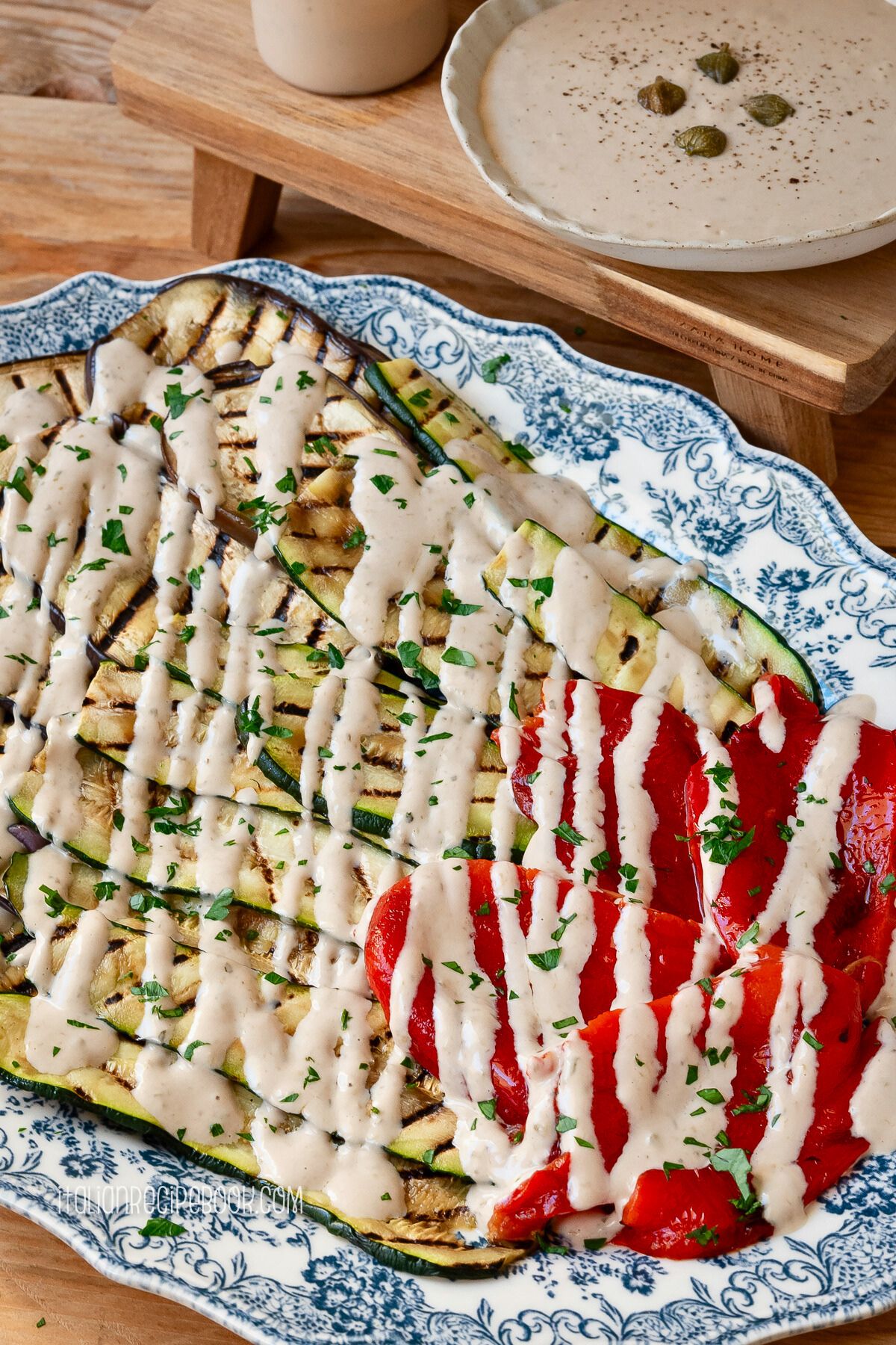 Grilled vegetables drizzled with salsa tonnata.