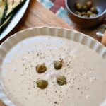 Tonnato Sauce in a serving plate garnished with capers.