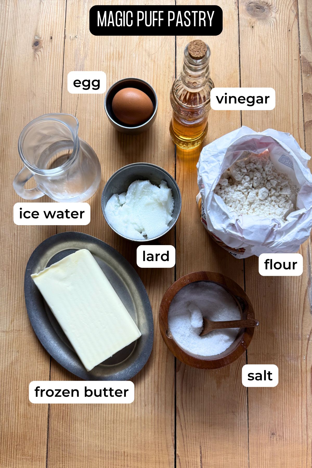 Puff Pastry Ingredients laid on a wooden surface.