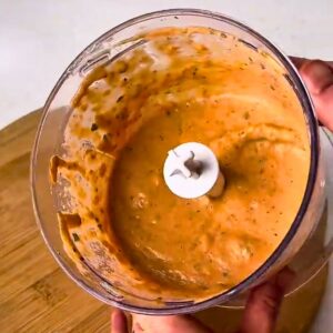Smooth creamy roasted tomato sauce blended in a food processor.